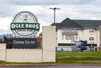 Ogle Brothers General Store with Lodge at Five Oaks behind it